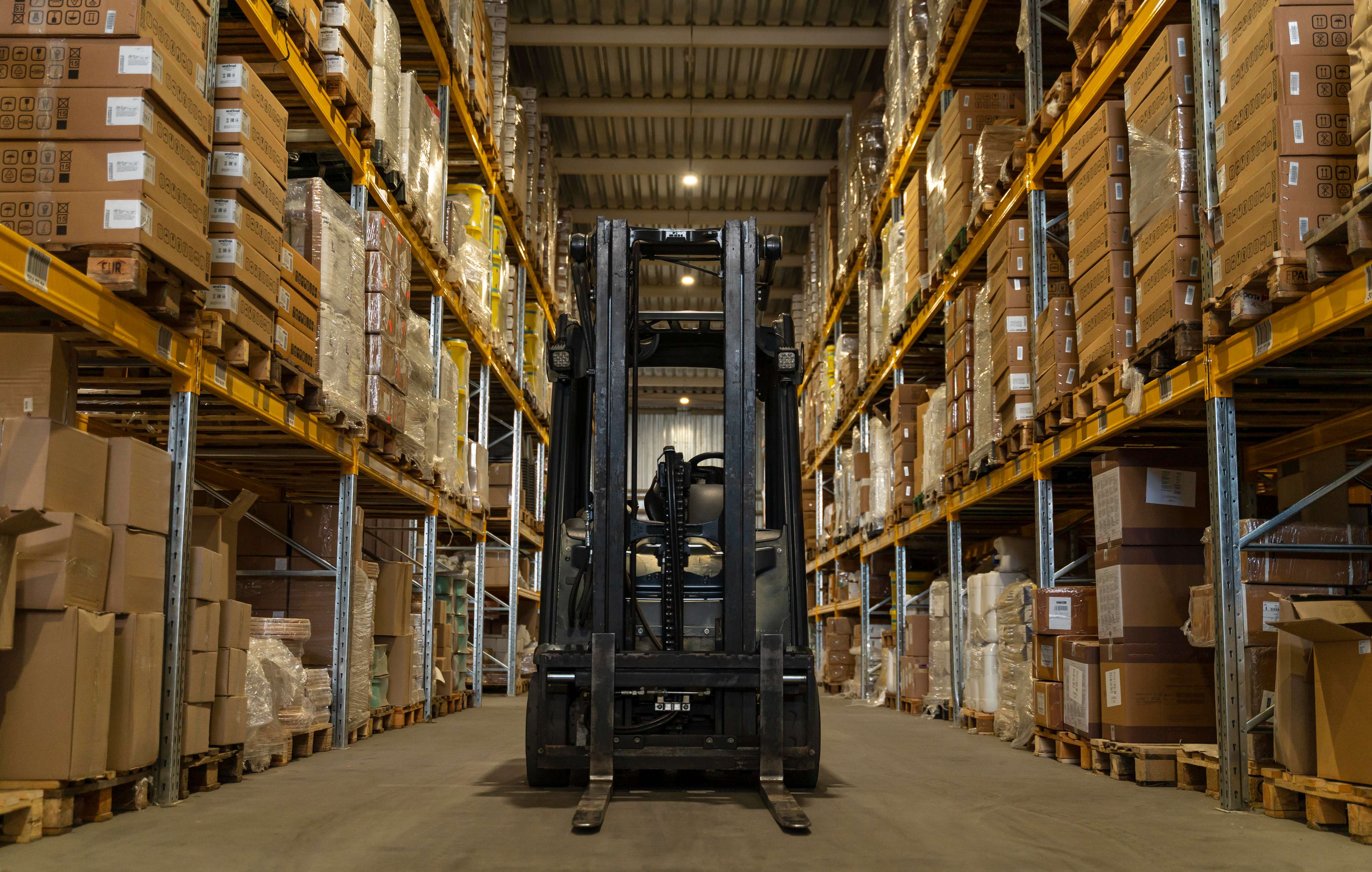 Forklift handling goods in a warehouse